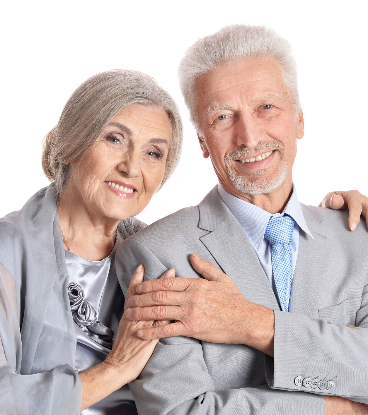Happy elderly couple holding eachother