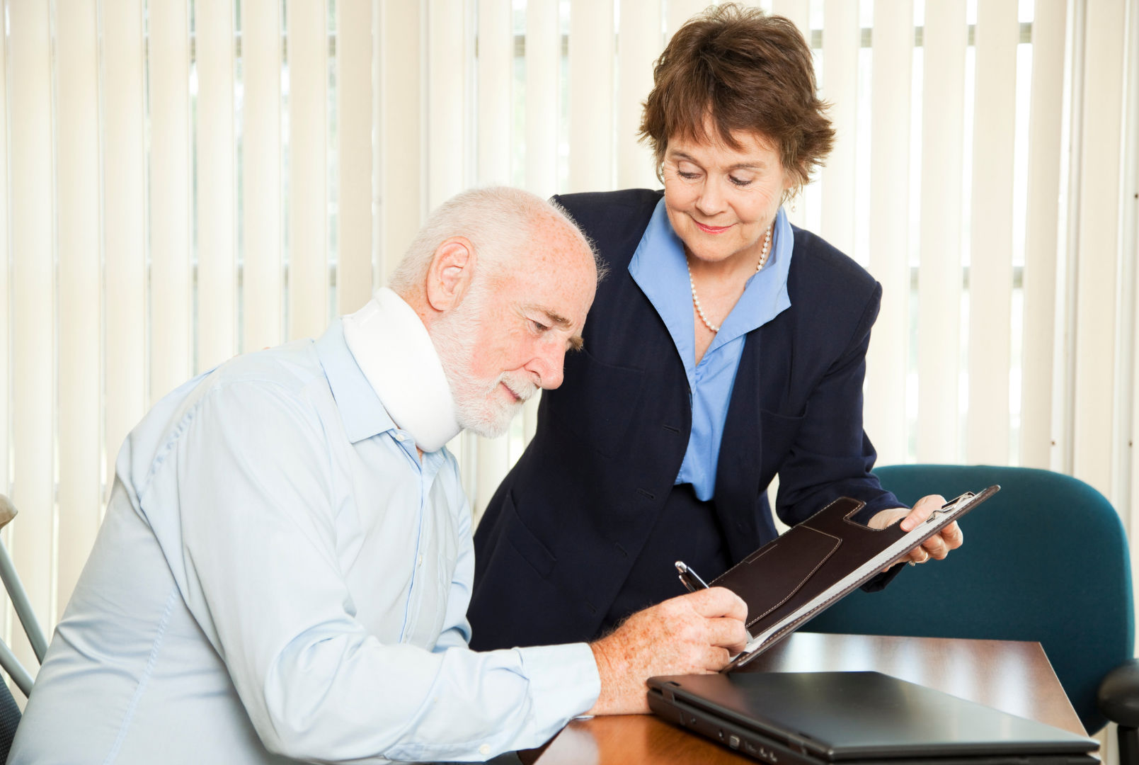 Professional helping an elderly man